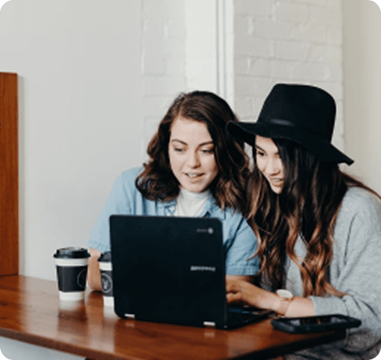 Students studying together on laptop